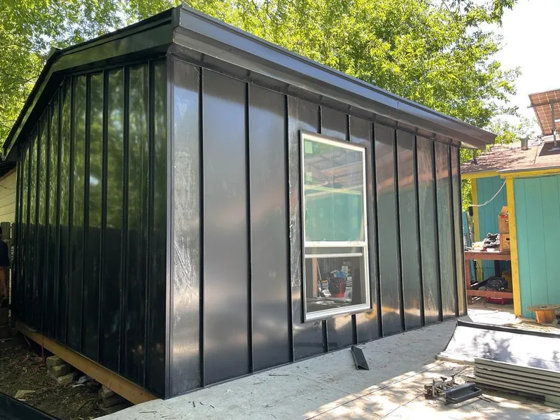 Black standing seam metal wall panels for Metal Roof Installation in Braidwood