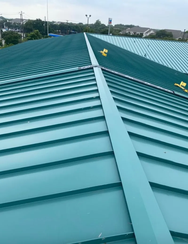 Green commercial metal roof ridge and valley for Metal Roof Repair in Braidwood