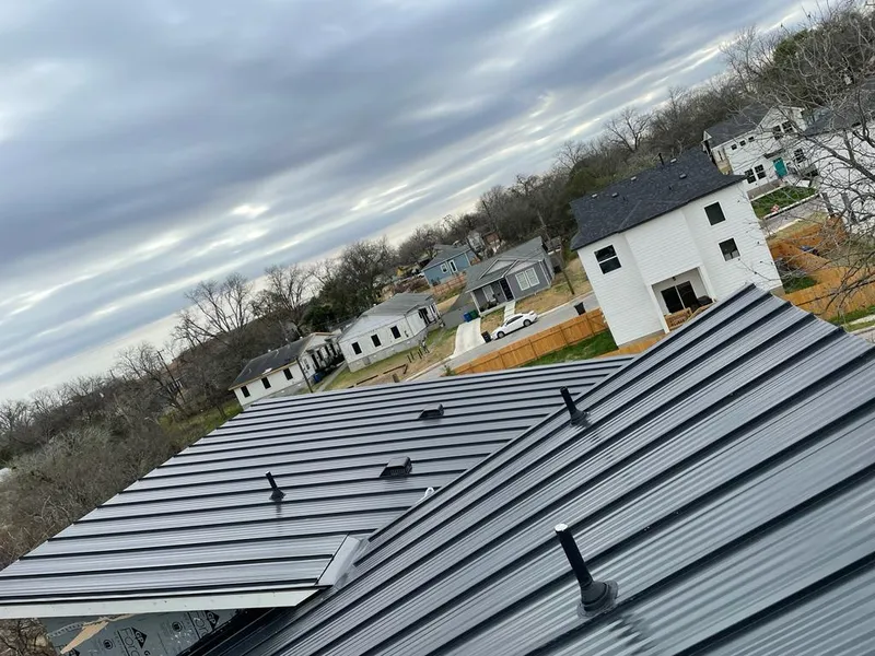 Standing seam metal roof panels with vents for Skylight Repair in Braidwood